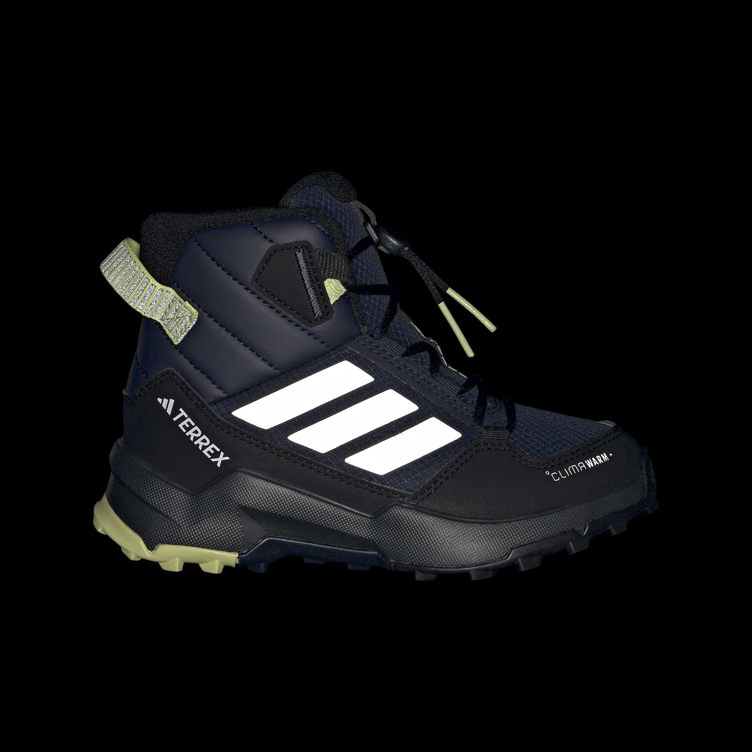Детски обувки adidas Terrex AX4R Mid – страничен изглед на тъмен фон със светещи при осветяване ленти adidas