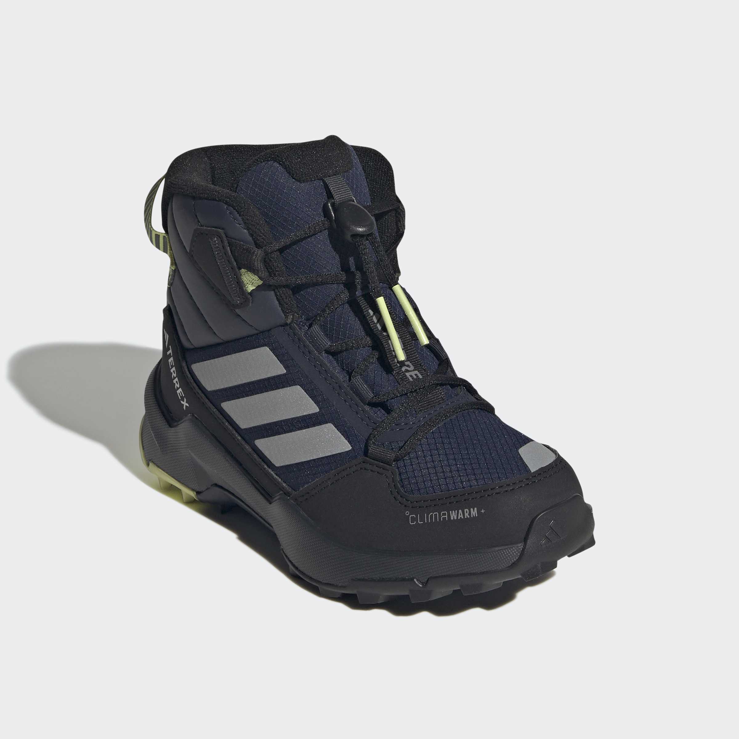 Детски зимни обувки adidas Terrex AX4R Mid KI5823 със средновисок профил, подсилен преден борд и бързи връзки