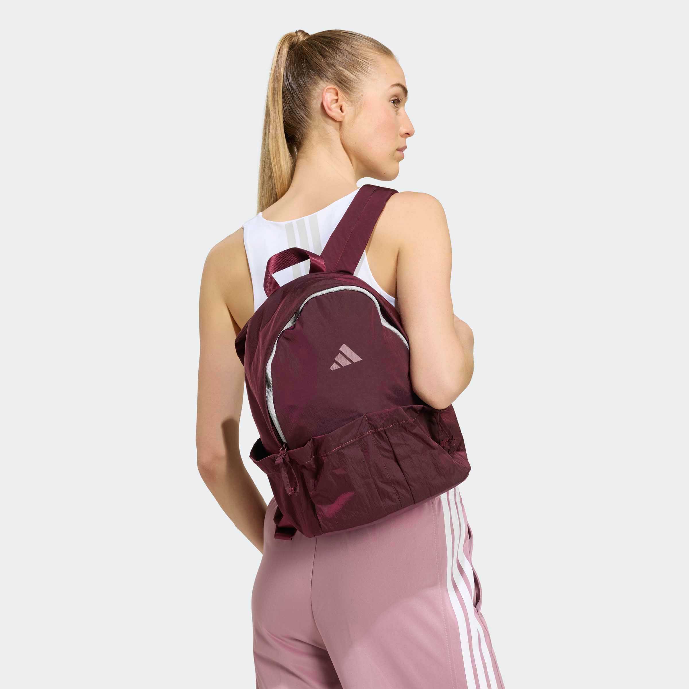 Дамска раница Adidas Glow KT4406 бордо – изглед върху модел